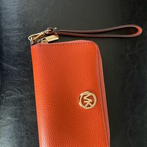 Michael Kors Tangerine Wristlet with Gold Logo